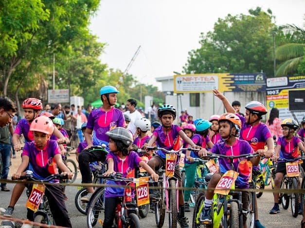 Kids cycling event on the highway