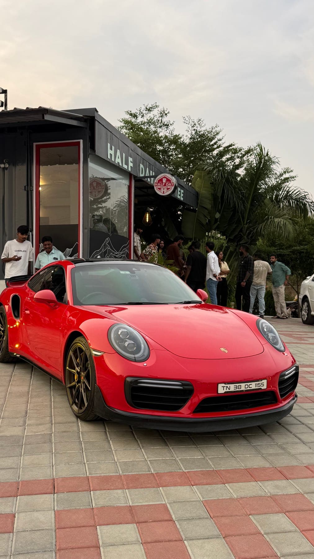 Red Porsche 911 at HalfDay Coffiee